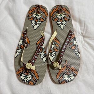 Tory Burch Beige Flip Flops with Orange Floral Print